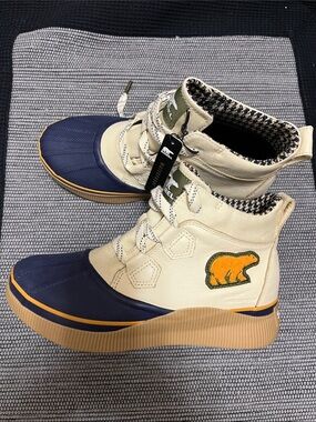 Sorel Duck Boots in Navy and Cream with Tan Trim